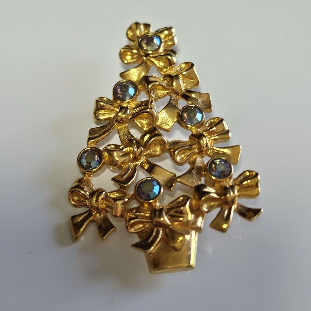 Vintage Avon Christmas Tree Bow Brooch Blue AB Rhinestones Gold Tone Pin - Picture 1 of 10